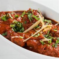 Lamb Vindaloo · Lamb cooked with potatoes in a flavorful curry
