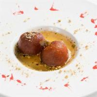 Gulab Jamun · Deep fried cake balls in a honey syrup. Served hot or cold