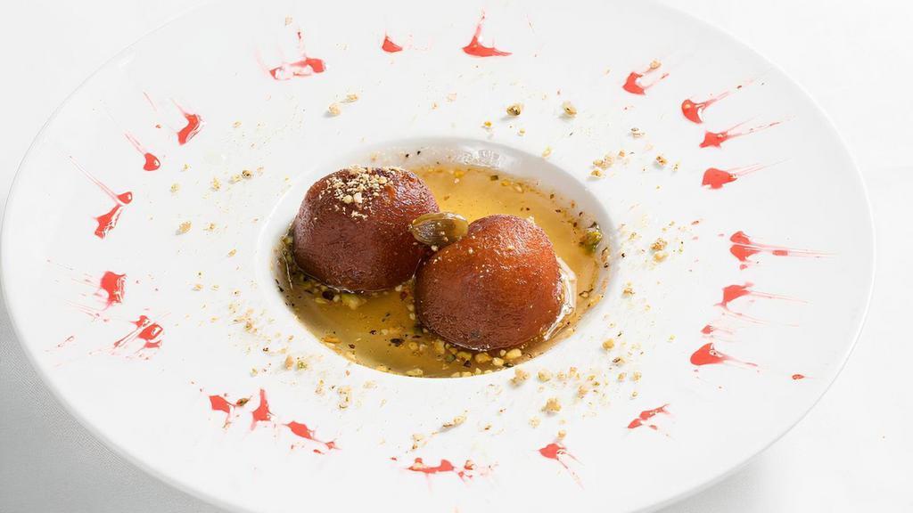 Gulab Jamun · Deep fried cake balls in a honey syrup. Served hot or cold
