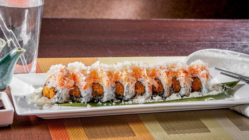 Snow Mountain Roll · in: spicy yellowiail crunch.
Oul: spicy crab crunch on top
