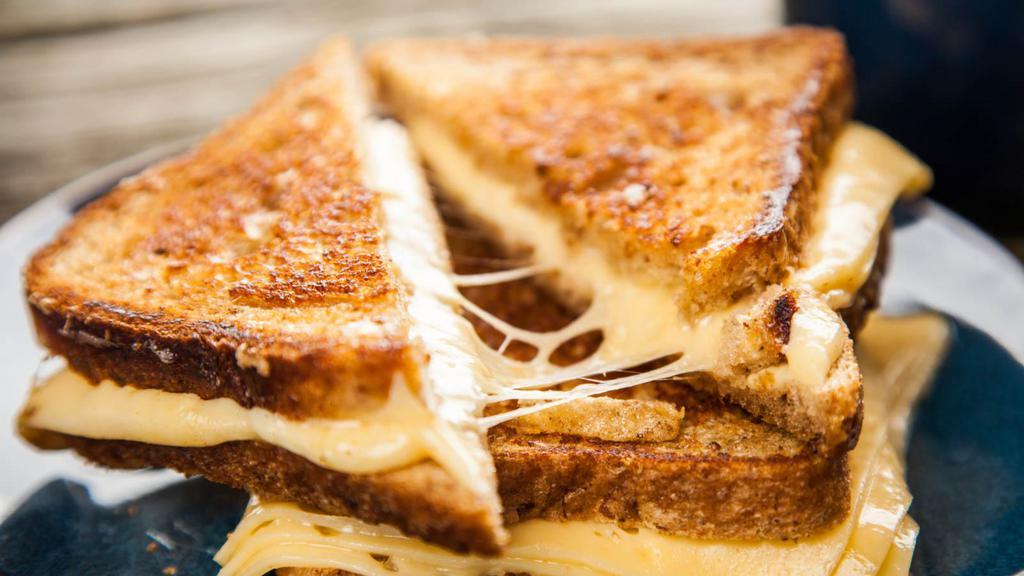 Muenster Cheese Sandwich · Delicious cheesy crispy buttery sandwich made with muenster cheese.