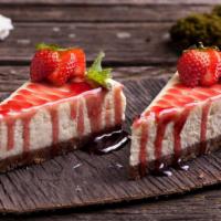 Strawberry Cheesecake · Delicious authentic classic cheesecake with strawberries.