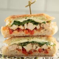 Grilled Chicken Panini · Fresh Mozzarella, Arugula, Roasted Pepper Bruschetta & Basil Mayo on Ciabatta