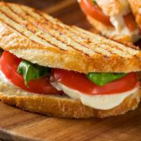 Italiano Panini · Marinated chicken with your choice of toppings, pesto sauce and melted fresh mozzarella chee...