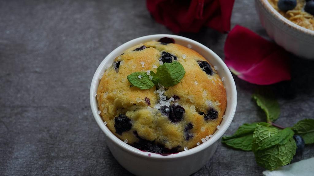 Blueberry Crumb Muffin · Moist, fluffy base with a buttery crumb topping.