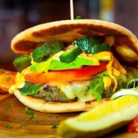Angry Julia Vegetarian Burger · Pepper Jack cheese, roasted jalapeno, lettuce, tomato, avocado & chipotle mayo