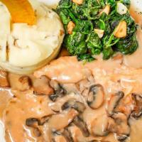 Chicken Marsala · Sauteed Chicken & Mushrooms in a Rich Wine Sauce served with Mashed Potatoes