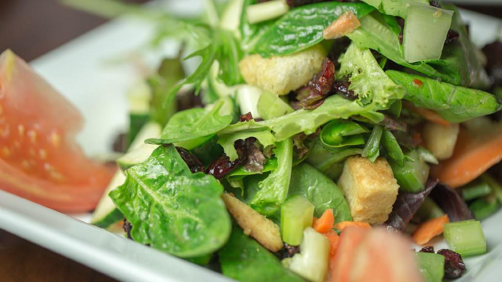 House Salad · Mesclun  greens, tomato, cucumber, celery, carrots, croutons & cranberries with Balsamic vinaigrette