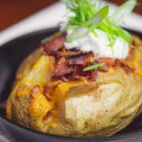 Baked Potato · A one-pounder with applewood bacon,cheddar cheese, sour cream, scallions & sea salt