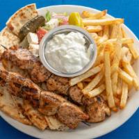 Souvlaki Platter · Pork or chicken served with Greek salad and French fries.