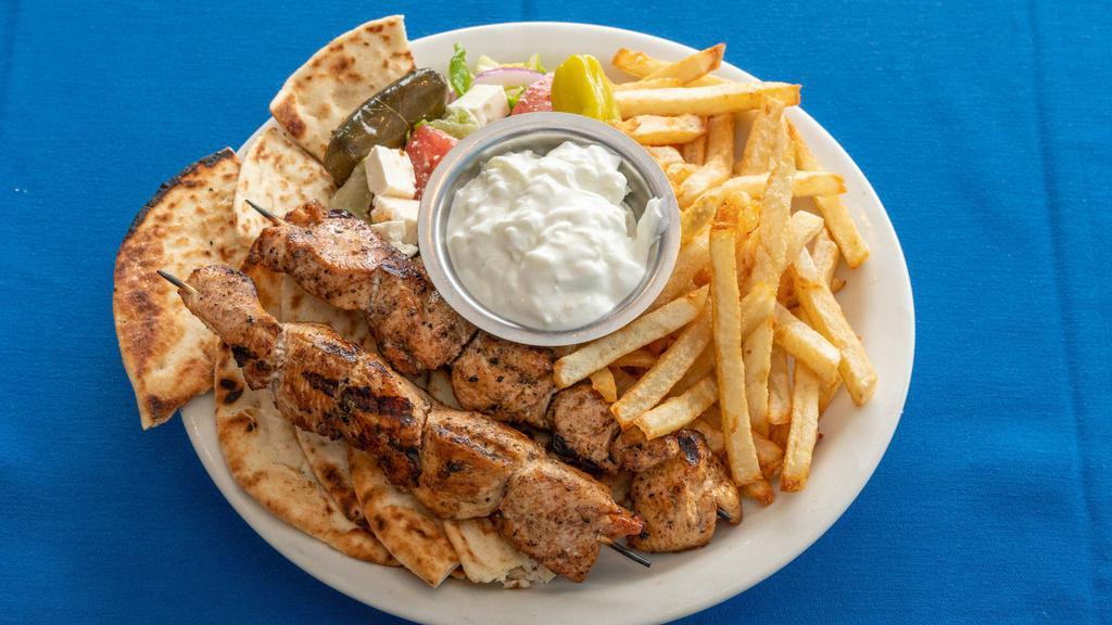 Souvlaki Platter · Pork or chicken served with Greek salad and French fries.