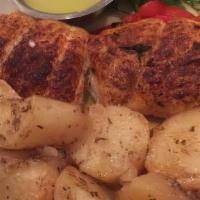 Fillet Of Sole · Freshly charbroiled with lemon juice, olive oil and Greek herbs. Served with roasted lemon p...
