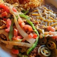 Machaca Con Huevos · Shredded beef, eggs, tomatoes, onions, and poblano peppers. Served with rice, beans, and you...