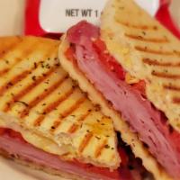 Ham & Pepper Jack Panini · Ham, Pepper Jack cheese, tomato, and roasted red peppers with Cajun mayonnaise. Served with ...