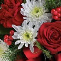 Red And White With X-Mas Greenery Bouquet · *If this bouquet is ordered out of season, product will just be red and white flowers with t...