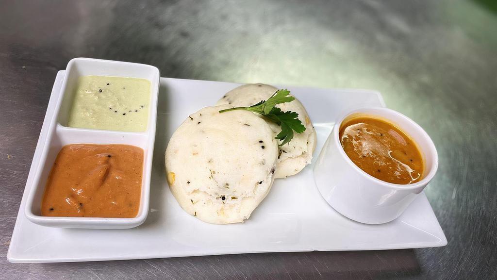 Rava Idli (2 Pc) · Rava Idli is a soft, pillowy steamed savory cake made from semolina and is a popular variation of the traditional South Indian Idlis
