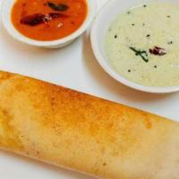 Sada (Plain) (Gf, Vegan) · Crispy rice and lentil crepe.  A dosa is a savory thin crepe made from a fermented batter of...