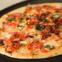 Mixed Vegetable Uttapam (Gf, Vegan) · Uttapam with onions, peas tomatoes, and carrots. Uttapam is a thick pancake, with toppings c...