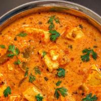 Kadai Paneer Masala (Gluten-Free, Dairy) · Cottage cheese cooked in creamy tomato sauce, onion, and Indian spices. All curries are serv...