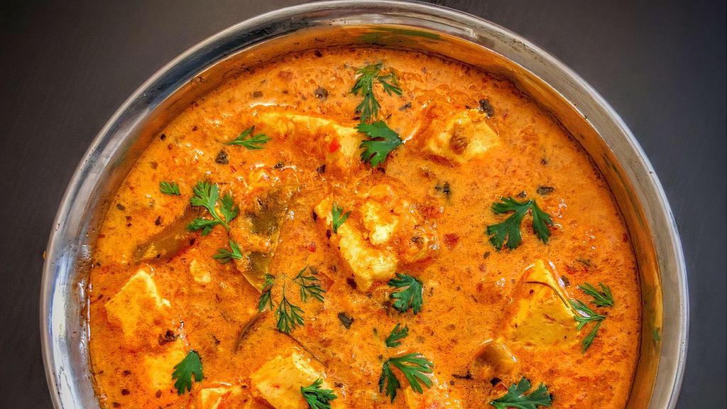 Kadai Paneer Masala (Gluten-Free, Dairy) · Cottage cheese cooked in creamy tomato sauce, onion, and Indian spices. All curries are served with basmati rice.