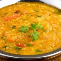 Yellow Dal (Gluten-Free, Vegan) · Yellow lentils tempered with cumin and garden herbs, yellow dal with spinach. All curries ar...