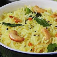 Lemon Rice (Has Nuts) · Lemon flavored rice. Served with sambar and papad.