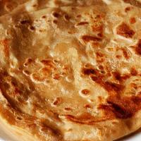 Lachha Paratha · Whole wheat flatbreads with flaky and crispy layers that are also soft and tender