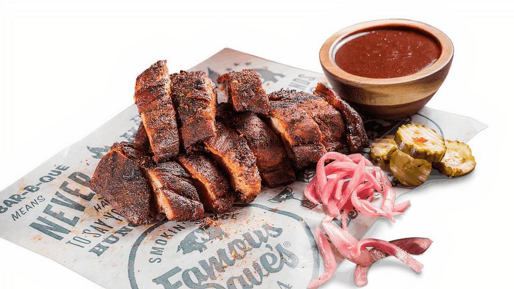 Southside Rib Tips Appetizer · Memphis-Style, dry-rubbed Rib Tips,  jalapeño pickled red onions, spicy Hell-Fire Pickles and our Southside BBQ sauce.