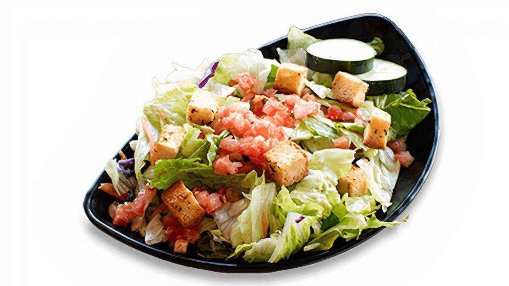 Fresh Garden Side Salad · Fresh cut iceberg lettuce, diced tomatoes, cucumbers, shredded cheddar, bacon, egg, and house-made croutons. Served with choice of dressing on the side.