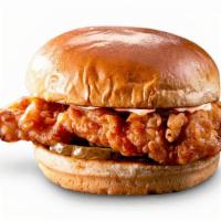 Iris' Comeback Chicken Sandwich · Famous Dave’s mother’s tried-and-true recipe: a hand-breaded crispy chicken breast on a butt...
