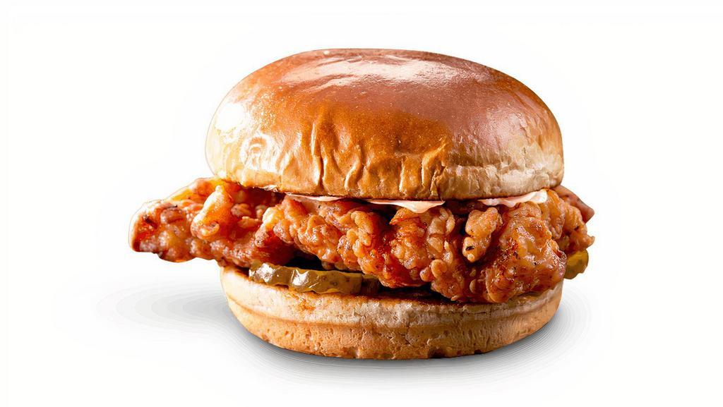 Iris' Comeback Chicken Sandwich · Famous Dave’s mother’s tried-and-true recipe: a hand breaded crispy chicken breast on a buttery toasted bun with spicy Hell-Fire Pickles and drizzled with our secret Comeback Sauce