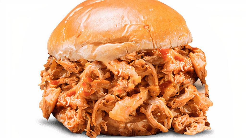 Bbq Pulled Chicken Sandwich · Roasted, pulled chicken tossed in Rich & Sassy®.. Served with choice of 1 side and spicy Hell-Fire Pickles.