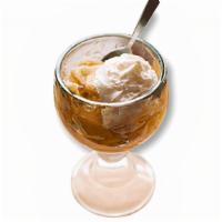 Peach Cobbler · Warm, flaky pie crust filled with peaches and topped with whipped cream..