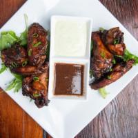 Jerk Chicken Wings · BBQ sauce, jerk sauce or tamarind sauce.