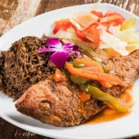 Whole Crispy Snapper · Escovitch peppers black rice creole sauce