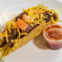Grilled Steak Taco · Served with iceberg lettuce, tomato and topped with Cheddar cheese.
