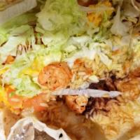 Shrimp Burrito · Served with rice, beans, lettuce, tomato and Cheddar cheese.