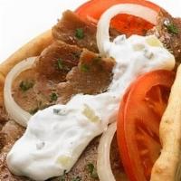 Lamb Gyro · Lamb with cooked onions,peppers, mix salad over pita bread.