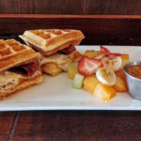 Waffle Sandwich · Fried eggs and bacon served on waffle with spicy maple.
