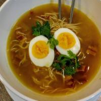 Breakfast Ramen · Spicy ginger broth with noodles, bacon, and egg.