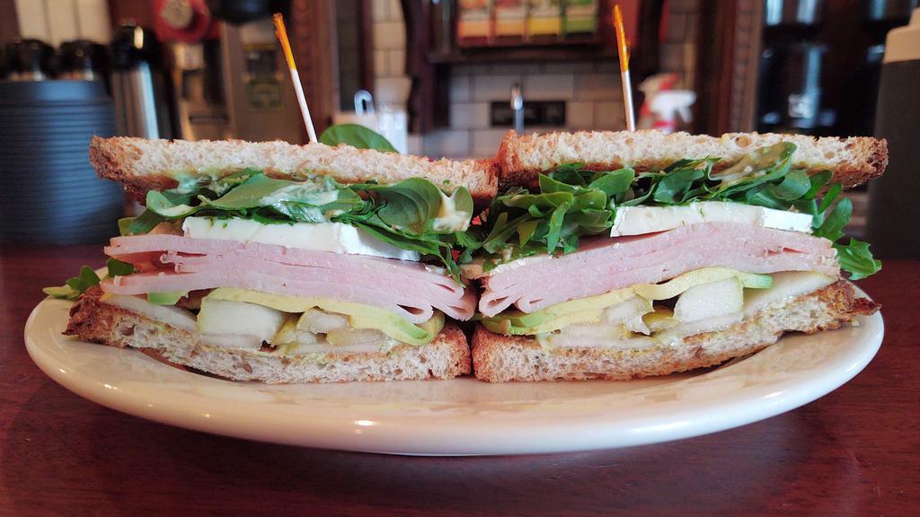 Turkey Pear · With brie, avocado, arugula, and herb Mayo on toasted multigrain.