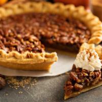 The Pecan Pie · Crunchy pecans surrounded by a sweet, rich sticky filling in a flaky pie crust.