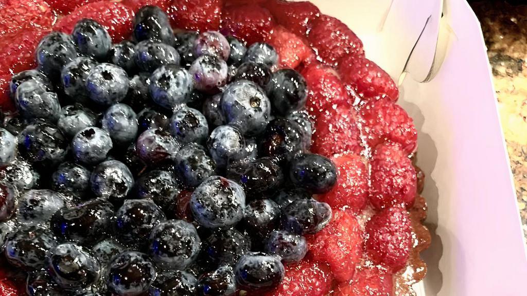 Raspberry Blueberry · Sugar crust, almond paste, pastry cream, raspberries & blueberries.