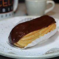 Éclair · Puff filled with chocolate, vanilla or coffee crème.