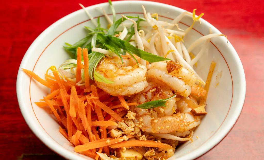 Pad Thai Noodles · Choice of protein in a sweet and savory sautée of thin rice noodles, egg, crushed peanuts, and preserved turnips topped with bean sprouts and scallions.