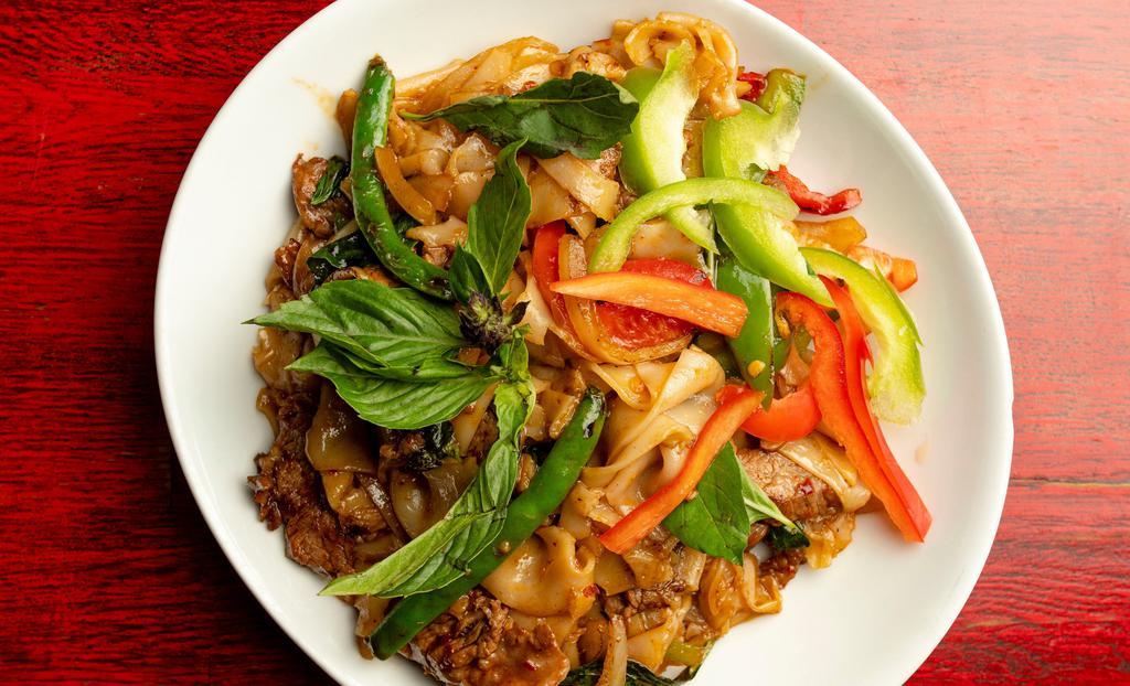 Hobo Noodles · Spicy. Choice of protein sautéed with bell pepper, basil, broad noodles, mushrooms and chili peppers.