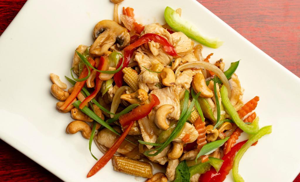 Chicken Cashew Nut · Bell pepper, mushroom, carrot, celery, onion, scallion, and cashew nuts sautéed with a blend of Thai seasoning.