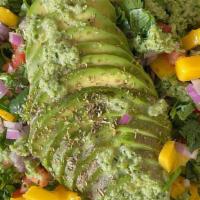 Aguacate Salad · avocado, romaine lettuce, mango salsa, onions, cilantro, mild jalapeño vinaigrette.
