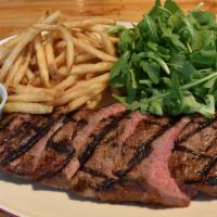 Argentinian Steak Frites · NY strip steak, fries, chimichurri sauce.