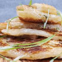 Scallion Pancake · pan fried scallion pancake with soy dipping sauce on the side.